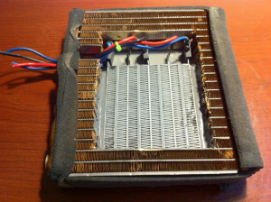 Ceramic heater element permanently installed in heater core Ceramic heater element permanently installed in heater core